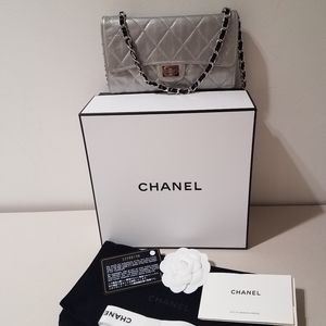 - Chanel Reissue Flap Wallet Lambskin